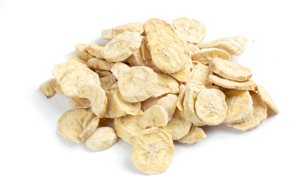 A pile of freeze dried banana on white background