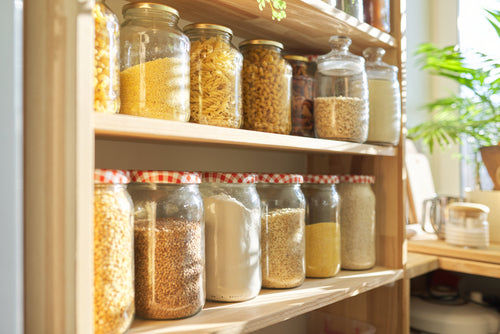 Wooden shelves in a large pantry for food storage